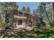 Charming stone home with a patio perfect for outdoor grilling at 2045 Pine Wood Rd, Sedalia, CO 80135