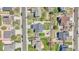 Aerial view of a backyard featuring a patio, trampoline, and well-kept lawn in a residential neighborhood at 5912 Randolph Ave, Castle Rock, CO 80104