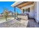 Cozy backyard with a hot tub and a covered patio offering backyard views at 5912 Randolph Ave, Castle Rock, CO 80104