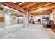 Spacious unfinished basement with concrete flooring and exposed ceiling, offering potential for various uses at 5912 Randolph Ave, Castle Rock, CO 80104