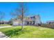 Well-maintained home with a spacious front lawn, charming front porch, and a welcoming curb appeal at 5912 Randolph Ave, Castle Rock, CO 80104