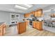 Well-equipped kitchen with wooden cabinets, a central island, and access to the backyard at 5912 Randolph Ave, Castle Rock, CO 80104