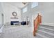 Stunning living room with high ceilings, large windows, and stylish furniture at 5912 Randolph Ave, Castle Rock, CO 80104