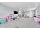 Large recreation room with natural light and toys at 5912 Randolph Ave, Castle Rock, CO 80104