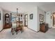 Inviting dining room with classic furniture, neutral decor, and natural light at 1062 Jasper St, Aurora, CO 80011