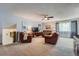 Cozy living room featuring plush seating, soft carpeting, and natural light, perfect for relaxation and gatherings at 1062 Jasper St, Aurora, CO 80011