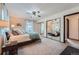 Serene bedroom with ample natural light, mirrored closet doors, and neutral decor for a peaceful retreat at 1062 Jasper St, Aurora, CO 80011