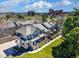 A bird's eye view of townhomes showcasing the neighborhood's layout, landscaping, and proximity to nearby buildings at 230 W Jamison Cir # 31, Littleton, CO 80120