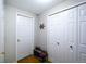 Hallway featuring multiple storage closets and access to other rooms at 230 W Jamison Cir # 31, Littleton, CO 80120
