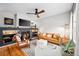 Stylish living room with a cozy fireplace, modern decor, and ample seating, perfect for relaxation and entertaining at 230 W Jamison Cir # 31, Littleton, CO 80120