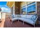 Cozy outdoor patio with comfortable seating, perfect for relaxing and enjoying the natural light at 230 W Jamison Cir # 31, Littleton, CO 80120
