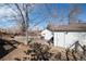 Spacious backyard with a detached garage and plenty of space for outdoor activities at 6361 S Spotswood Cir, Littleton, CO 80120