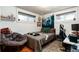 Cozy bedroom with hardwood floors, natural light, and unique decor at 6361 S Spotswood Cir, Littleton, CO 80120