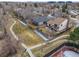 A nice aerial view shows the backyard of a home with a walking path and common area at 12592 E Bates Cir, Aurora, CO 80014