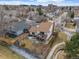 Aerial view of the home with a large fenced yard in a neighborhood near the city at 12592 E Bates Cir, Aurora, CO 80014