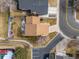 A top-down aerial view shows the roof and backyard of a home in a quiet neighborhood at 12592 E Bates Cir, Aurora, CO 80014