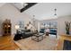 Spacious living room with a large window, natural light, and hardwood floors at 12592 E Bates Cir, Aurora, CO 80014