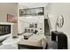 Bright living room boasts hardwood floors, fireplace, loft, and staircase to the upper level at 8055 E Colorado Ave # 8, Denver, CO 80231