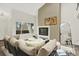 Comfortable living room offers bright light, fireplace, and stylish decor at 8055 E Colorado Ave # 8, Denver, CO 80231