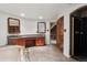 Spacious bathroom with dual vanities, a shower, tile flooring, and classic accents at 22081 Paradise Cir, Golden, CO 80401