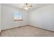 Bright bedroom with ceiling fan and window coverings at 22341 E Mercer Pl, Aurora, CO 80018