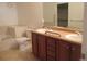 Bathroom with double vanity and walk-in shower at 2239 Calais Dr # E, Longmont, CO 80504