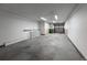 This empty garage features bright lighting and space for storage at 2239 Calais Dr # E, Longmont, CO 80504