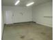 Attached garage with extra storage and interior access at 2239 Calais Dr # E, Longmont, CO 80504