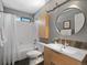 Well-lit bathroom features a shower/tub combo, and a modern vanity at 22 S Indiana Pl, Golden, CO 80401