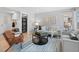 Comfortable living room showcasing neutral tones, a stylish rug, and cozy seating arrangements at 22 S Indiana Pl, Golden, CO 80401