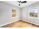 Bright room with beautiful hardwood flooring and dual paned windows that provide natural light and outdoor views at 5100 Clay St, Denver, CO 80221