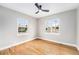 Bright room with hardwood flooring and dual paned windows that provide natural light and outdoor views at 5100 Clay St, Denver, CO 80221