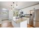 Modern kitchen features granite countertops, stainless steel appliances, and ample cabinet space at 5100 Clay St, Denver, CO 80221