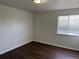 Bright bedroom offers updated floors and ample space at 13959 Eudora St, Thornton, CO 80602