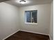Cozy room featuring hardwood floors, and a window with natural light at 13959 Eudora St, Thornton, CO 80602