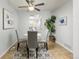 Bright dining area featuring stylish decor, neutral colors, and a ceiling fan at 8260 Washington St # 78, Denver, CO 80229