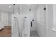 Modern bathroom with sleek glass-enclosed shower and stylish fixtures, bright, and roomy at 9630 N Surrey Dr, Castle Rock, CO 80108