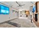 Unfinished basement with shelves and some cabinets at 1057 S Osceola St, Denver, CO 80219