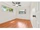 Empty bedroom with two windows providing lots of natural light at 1057 S Osceola St, Denver, CO 80219