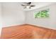 Bedroom featuring a large window providing lots of natural light at 1057 S Osceola St, Denver, CO 80219