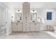 A clean bathroom boasts double sinks and vanities, with a window and a separate toilet room at 1157 Jersey St, Denver, CO 80220