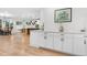 Bright kitchen features stainless appliances, quartz countertops, and open layout for entertaining at 1157 Jersey St, Denver, CO 80220