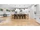 Spacious kitchen featuring a large island with seating, stainless steel appliances, and a breakfast nook at 1157 Jersey St, Denver, CO 80220