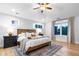 Large main bedroom with hardwood floors, natural light, and neutral décor at 1157 Jersey St, Denver, CO 80220