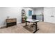 Home office with modern desk, chair, shelving and storage, providing a functional workspace at 1157 Jersey St, Denver, CO 80220