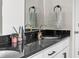Bathroom with a granite countertop, modern fixtures, and decor accents, providing a refreshing and stylish space at Reunion Freunion F Mobile St, Commerce City, CO 80022