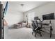 Bright bedroom with a cozy seating area and a functional workspace for study or work-from-home activities at Reunion Freunion F Mobile St, Commerce City, CO 80022