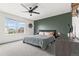 Bright bedroom with a large window offering great outdoor views and stylish interior that ensures a restful ambiance at Reunion Freunion F Mobile St, Commerce City, CO 80022