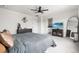Bedroom featuring neutral decor, complemented by a TV and modern furnishings for comfort and style at Reunion Freunion F Mobile St, Commerce City, CO 80022