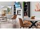 Cozy living room with a fireplace, shelving, and comfortable seating at Reunion Freunion F Mobile St, Commerce City, CO 80022